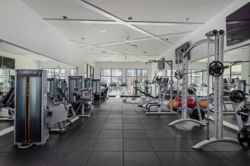 a gym with lots of treadmills and machines at The Edge at Millenia in Orlando