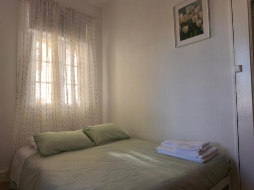 Postel nebo postele na pokoji v ubytování Casa do Adro