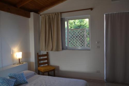 Postel nebo postele na pokoji v ubytování B&B l'Antropologo