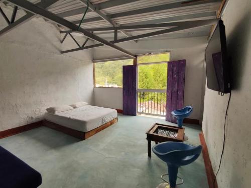 Φωτογραφία από το άλμπουμ του Hostal Casa Pijao σε Pijao