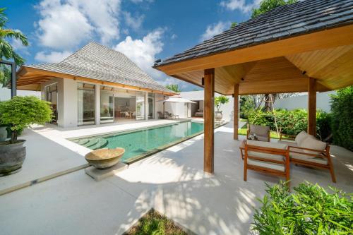 an image of a villa with a swimming pool and a pavilion at Anchan 4 bedroom near Beach in Phuket