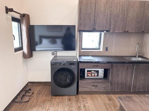 Kuchyň nebo kuchyňský kout v ubytování Picnic Day Danang