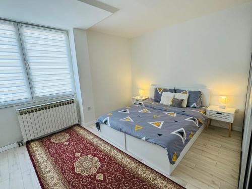 Postel nebo postele na pokoji v ubytování Modern & Cozy apartment in center -Walk everywhere