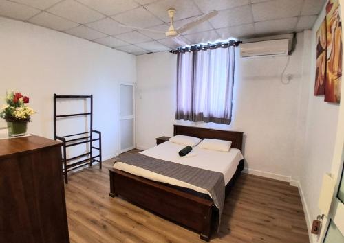 Postel nebo postele na pokoji v ubytování Mbeach Nest