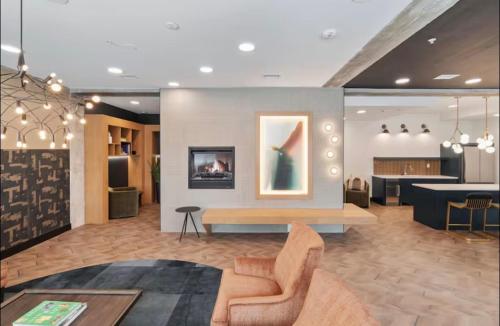 a living room with a couch and a table at Luxury 2 bedroom 2 bath DT Stay in Salt Lake City