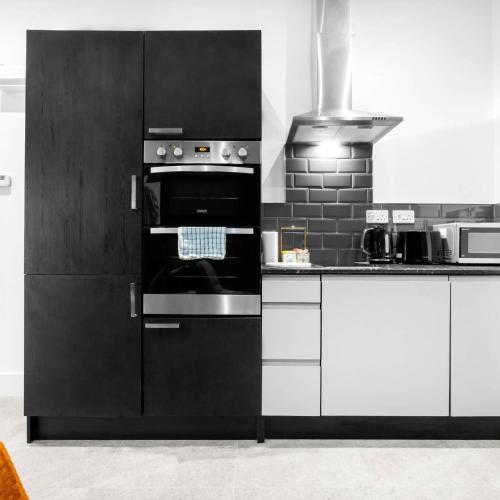 Køkken eller tekøkken på Cozy Apartment - Netflix - On Street Parking - Rowley Regis 49G
