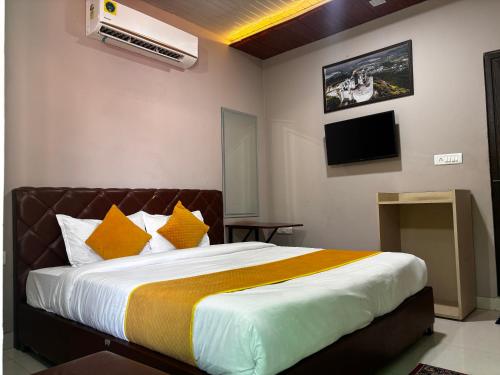 Postel nebo postele na pokoji v ubytování Seven Hills Resort