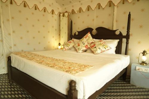 Postel nebo postele na pokoji v ubytování Tiger Echo Resort