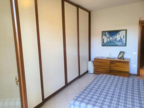 Ένα ή περισσότερα κρεβάτια σε δωμάτιο στο Elegante appartamento in posizione strategica