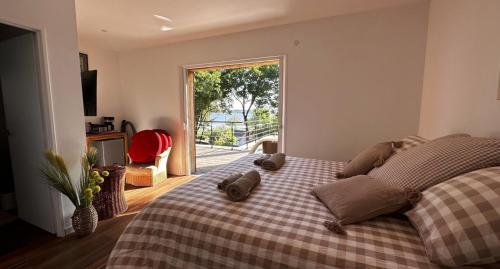 Giường trong phòng chung tại Villa Mimosa - Vue Exceptionnelle