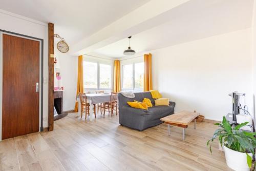 Et opholdsområde på Maison privée avec jardin Chez Marcelle