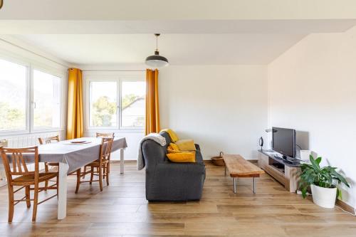 Et opholdsområde på Maison privée avec jardin Chez Marcelle