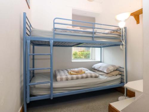 Postel nebo postele na pokoji v ubytování 2 Argoed