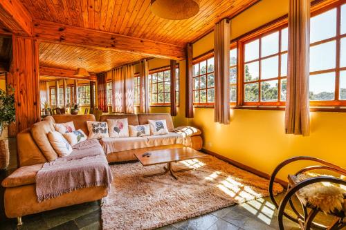 Χώρος καθιστικού στο VELINN Recanto das Hortencias Hotel