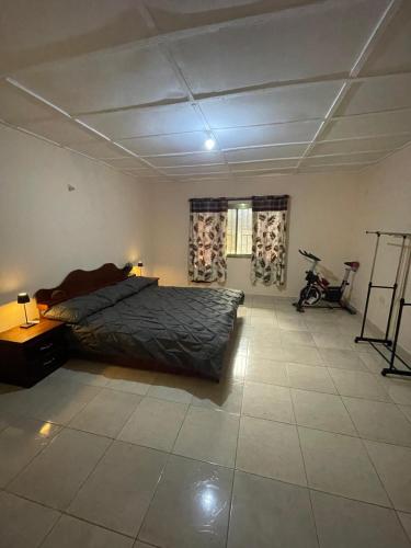 Postel nebo postele na pokoji v ubytování Brimelia Lodge