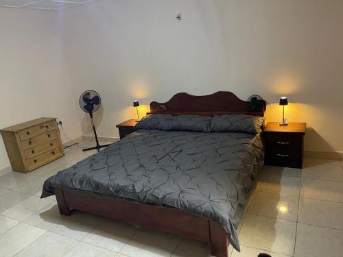 Postel nebo postele na pokoji v ubytování Brimelia Lodge