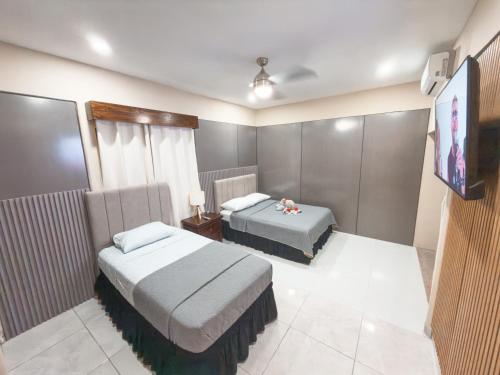 Postel nebo postele na pokoji v ubytování Casa CAXTUS