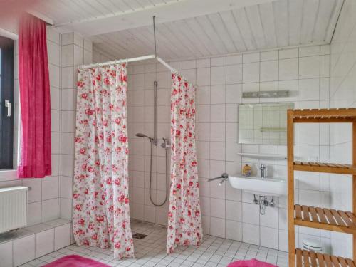a bathroom with a shower and a sink at Schwermann in Schmallenberg