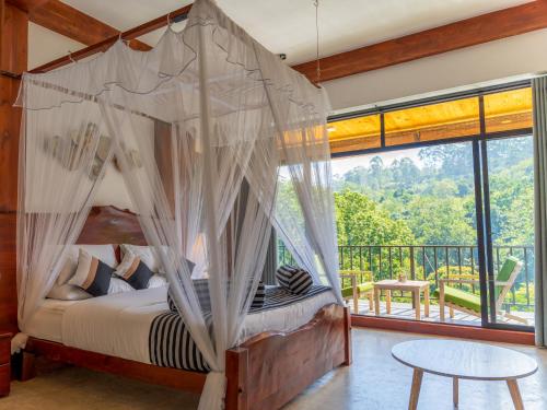 Ένα ή περισσότερα κρεβάτια σε δωμάτιο στο Ella Trail Luxury Villa