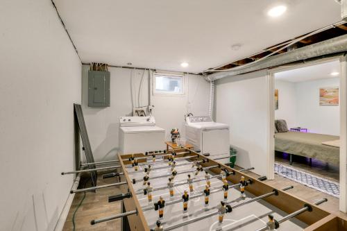 a room with a group of robots in a room at 1 Mi to Truman Library Apt with Large Yard! in Sugar Creek