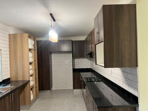 Η κουζίνα ή μικρή κουζίνα στο M Lodge