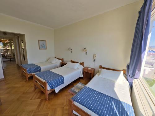 Ένα ή περισσότερα κρεβάτια σε δωμάτιο στο Hotel Panoramico