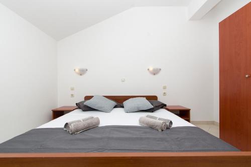 Posteľ alebo postele v izbe v ubytovaní Apartments Vela Luka