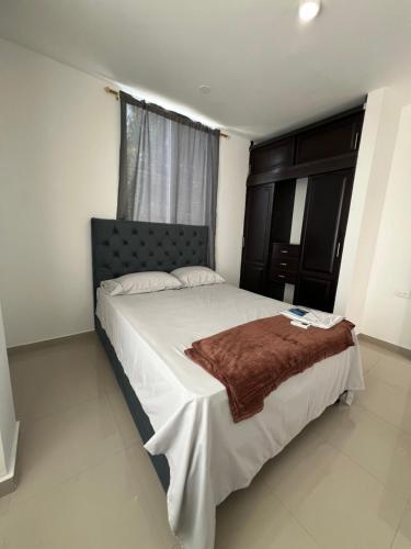 Postel nebo postele na pokoji v ubytování Apartamentos Full Confort en el corazón de Valledupa