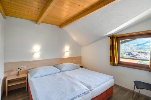 Ένα ή περισσότερα κρεβάτια σε δωμάτιο στο Appartement Nr 21 Haus Voglreiter