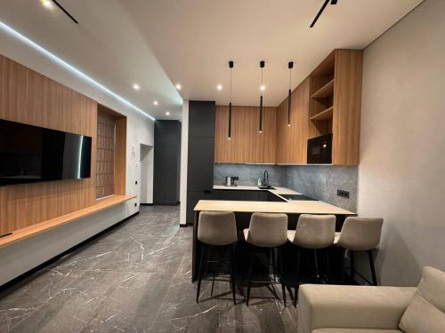 Η κουζίνα ή μικρή κουζίνα στο Cozy apartment in Lviv