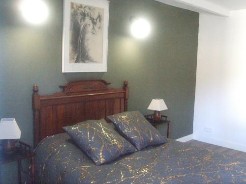 Ένα ή περισσότερα κρεβάτια σε δωμάτιο στο Chez Béa