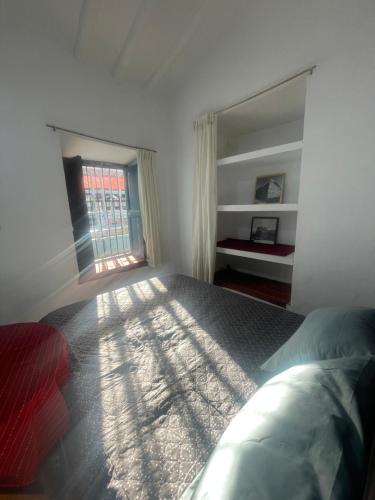 Giường trong phòng chung tại Casona Tres Reyes