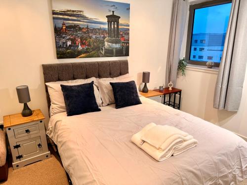 En eller flere senge i et værelse på Britannia Ocean Park Apartments - Fast Wifi and Free Parking