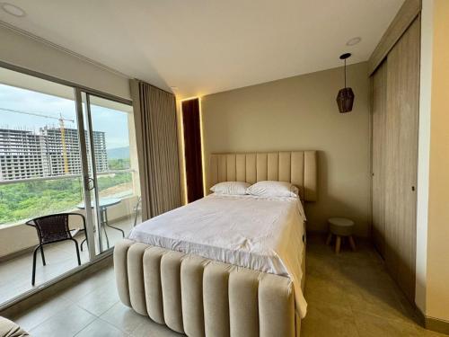 Ένα ή περισσότερα κρεβάτια σε δωμάτιο στο Apartamento cerca del mar- SantaMarina-604