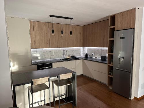 Kuchyň nebo kuchyňský kout v ubytování Arigato