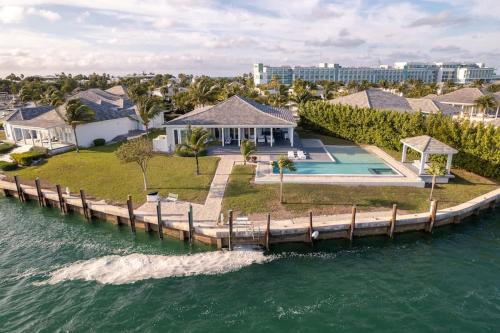 an aerial view of a house on the water at Bimini Breeze Villa in Bailey Town
