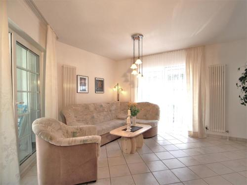 Χώρος καθιστικού στο Birkmaase 14 - Komfort FeWo im 4-Sterne-Ferienhaus Anselm EG