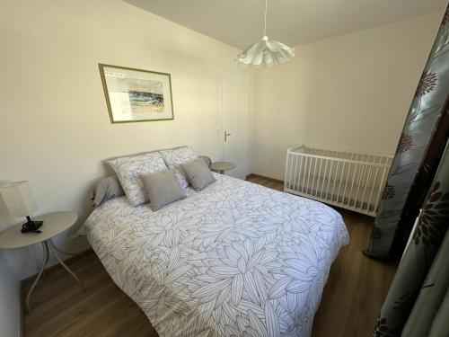 Ένα ή περισσότερα κρεβάτια σε δωμάτιο στο Chambre d'hôtes Chez Papi,meublé tourisme 3 étoiles