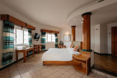 Postel nebo postele na pokoji v ubytování Casa Tobalá