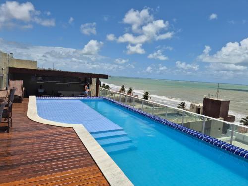 Πισίνα στο ή κοντά στο Flat Mar Bello Plaza