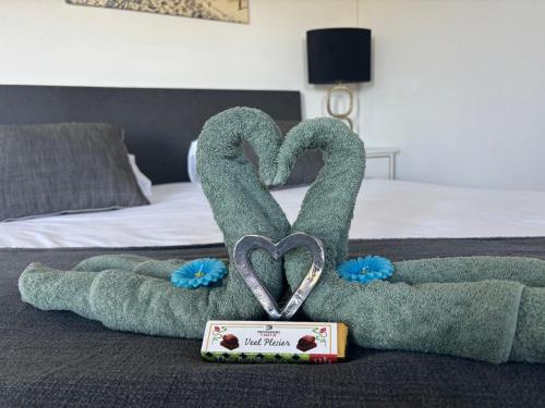 Postel nebo postele na pokoji v ubytování DE WEELEN met Jacuzzi en of Zwembad Topkeuze Romantiek