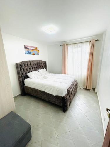 Ένα ή περισσότερα κρεβάτια σε δωμάτιο στο Casa Cosy