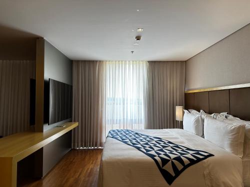 Postel nebo postele na pokoji v ubytování Brasília Palace Hotel