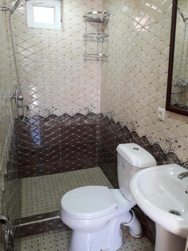 Ένα μπάνιο στο Green Garden Resthouse