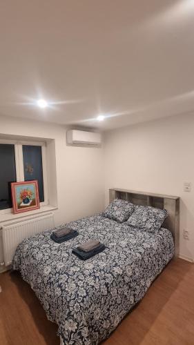 Ένα ή περισσότερα κρεβάτια σε δωμάτιο στο Gîte chez Suzannala