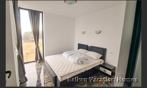 En eller flere senge i et værelse på Luxe 1 Monte Carlo Suite