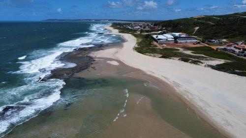 an aerial view of the beach and ocean at Pousada Ventoria in Canguaretama
