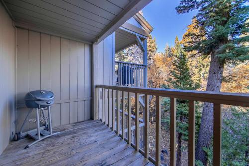 a balcony of a house with a grill at Creekside Chalet Stay for 6 in Kings Beach
