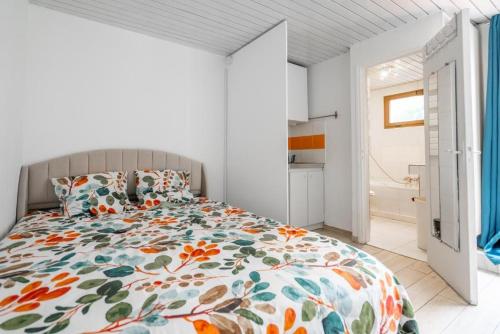 Llit o llits en una habitació de Studio Notre Dame