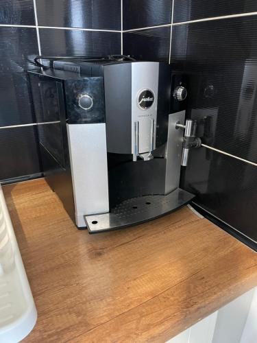 a coffee maker sitting on top of a counter at Apartament w centrum in Rymanów-Zdrój
